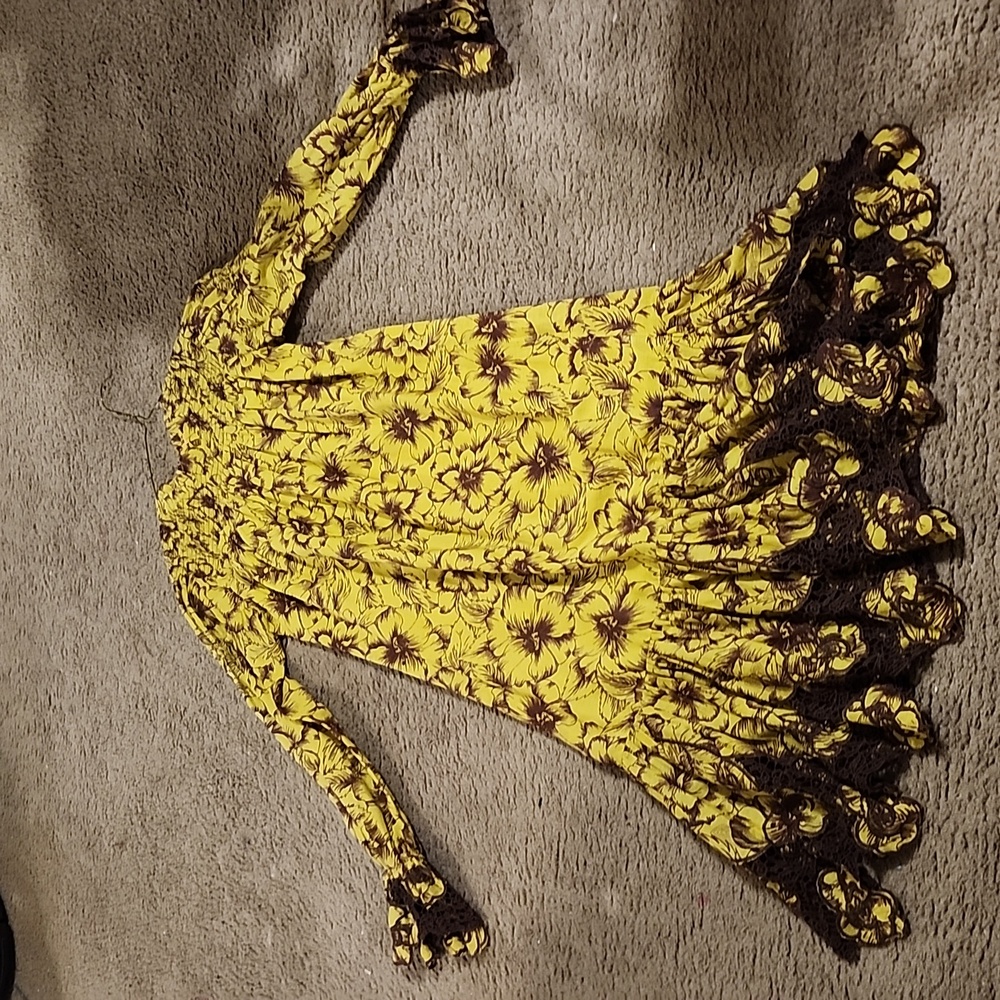 Yellow dress about midi length.
